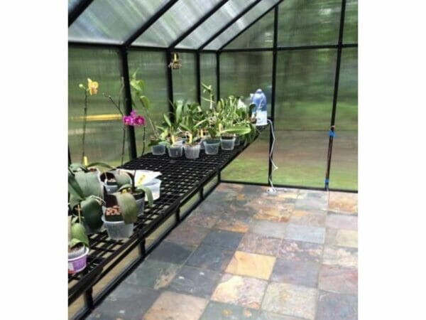 Riverstone Monticello Greenhouse 8x24 - Premium Package - interior side view with plants