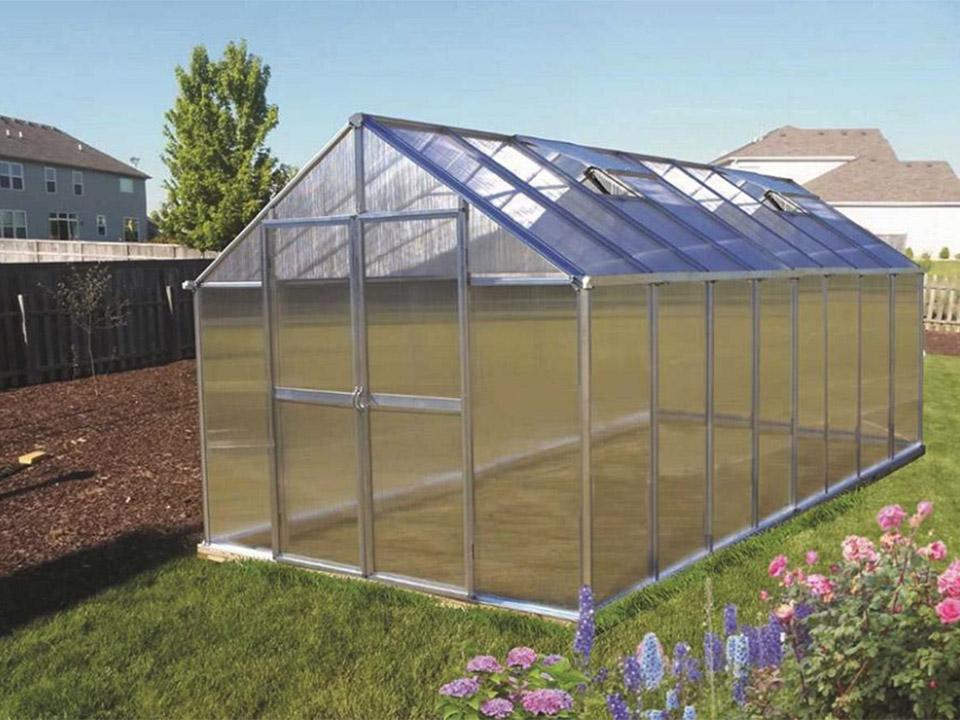 Bare Riverstone Monticello polycarbonate Greenhouse in garden