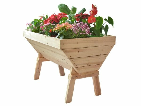 Eden V-Shaped Garden Table made from solid wood with plants and white background