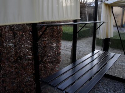 Exaco Slatted Greenhouse Shelving installed in a Janssens Greenhouse