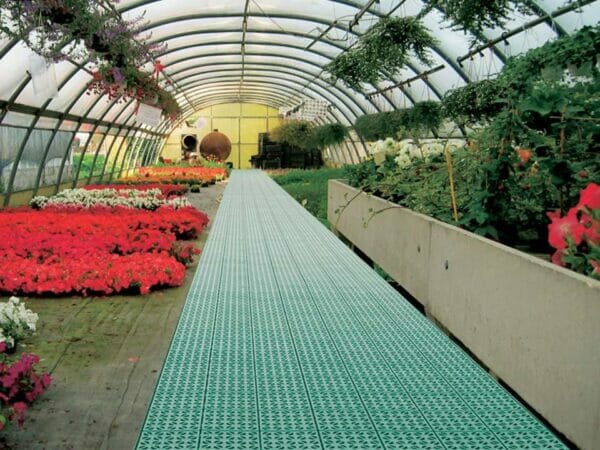 Riverstone Flooring Panels in a greenhouse