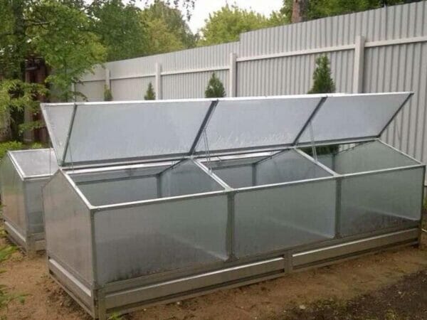 Three attached Delta Park Gable Roof Cold Frame with open roof panels