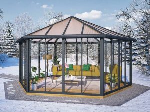Garda Garden Pavilion with a living room set up in a garden