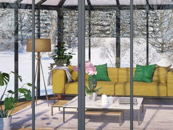 Close up view of Garda Garden Pavilion with a living room set up inside