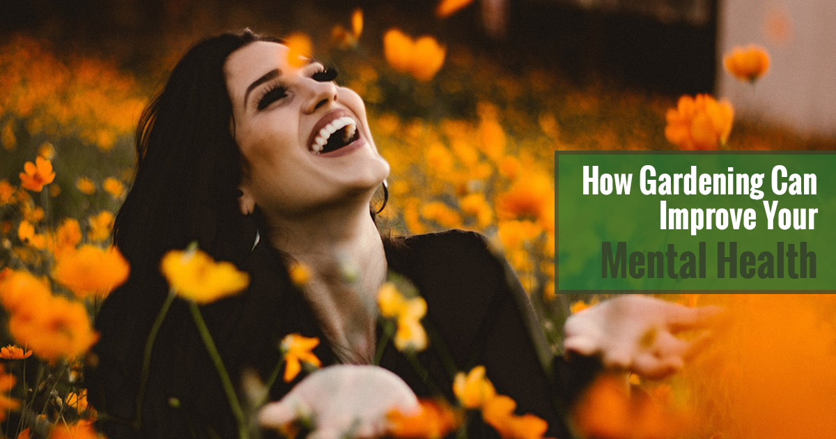 Woman laughing surounded by flowers with the text How Gardening Can Improve Your Mental Health