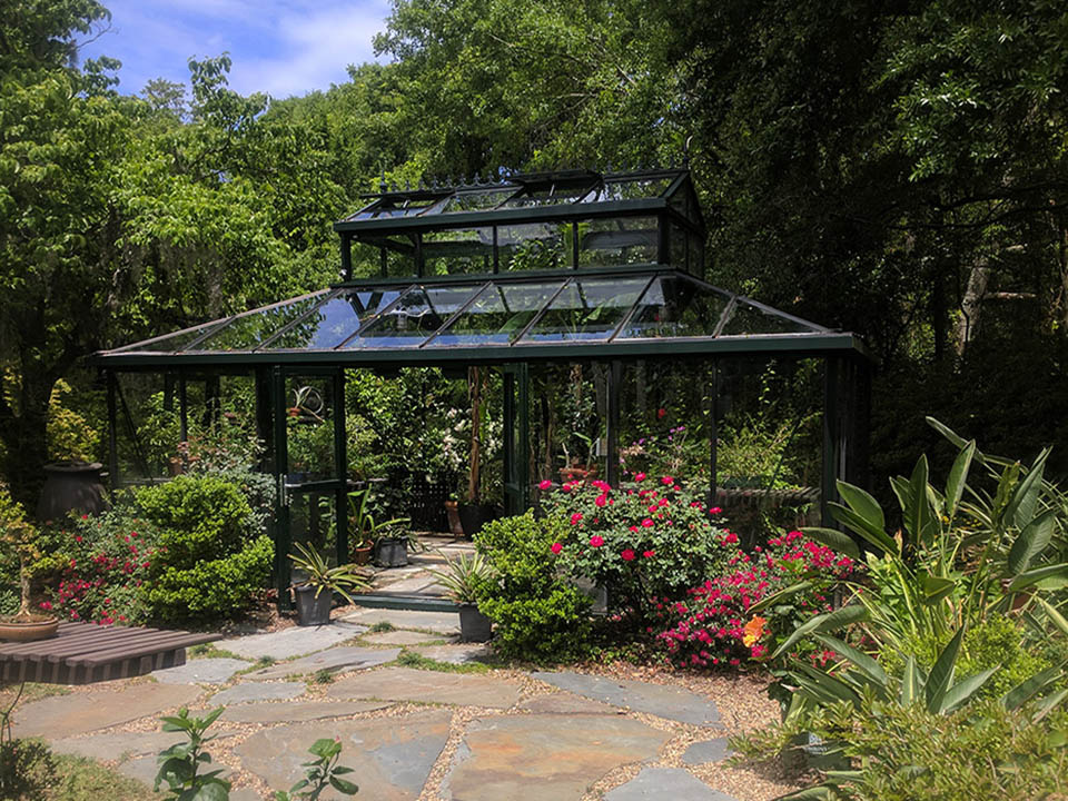 Glass greenhouse in a garden