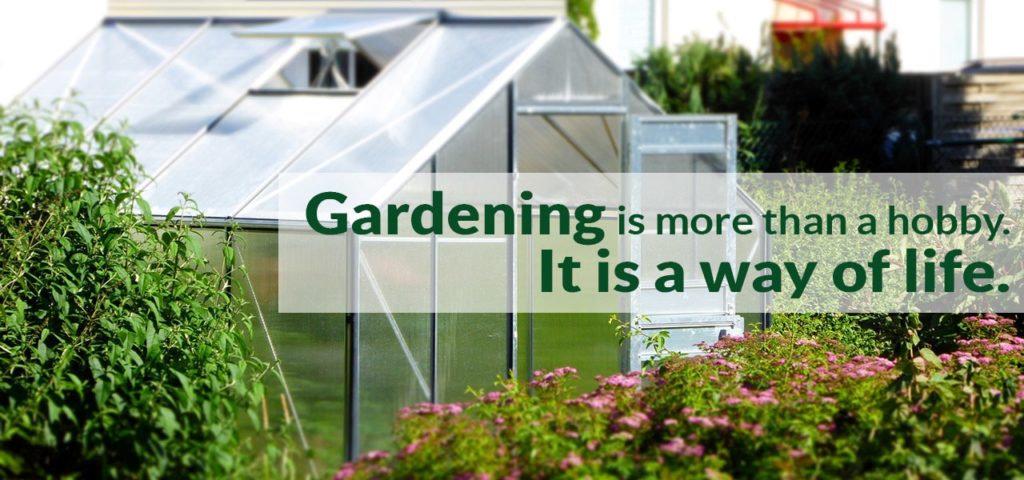 Greenhouse in a garden with the text: Gardening is more than a hobby. It is a way of life.