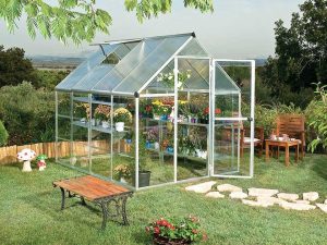 Palram Hybrid 6ft x 8ft Hobby Greenhouse-HG5508(G) - full view - in a garden