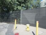 Riverstone Black Knitted Shade Cloth as a privacy fence