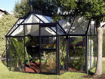 Frontal view of the Janssens T-Shaped Junior Victorian Orangerie with open sliding door