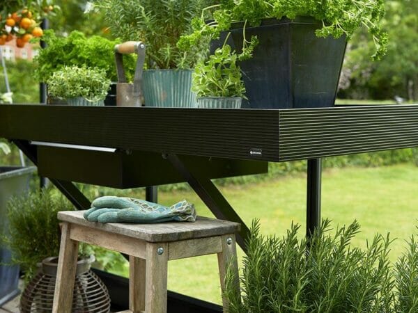 Juliana Oase Anthracite Toughened Glass 12ft x 12ft. Interior working bench with plants
