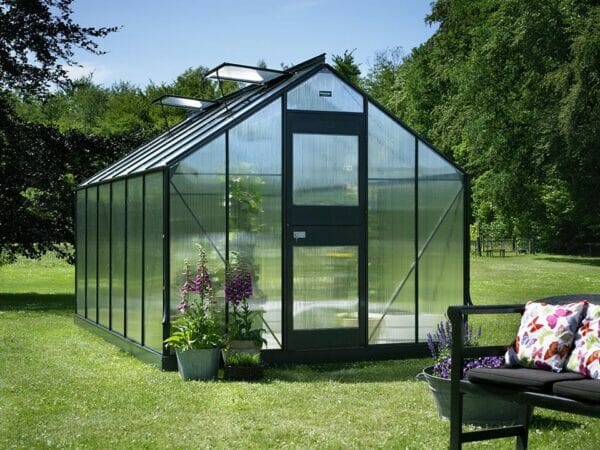 Juliana Junior Greenhouse 9ft x 14ft - Anthracite 6 mm Polycarbonate - closed door - front view - in a garden
