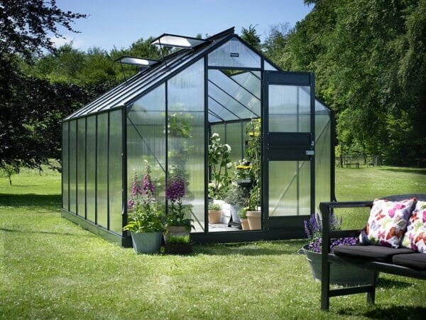 Juliana Junior Greenhouse 9ft x 14ft - Anthracite 6 mm Polycarbonate - open door open roof vents - front view - in a garden