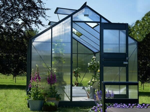 Juliana Junior Greenhouse 9ft x 14ft - Anthracite 6 mm Polycarbonate - open door - open roof vents - front view - in a garden