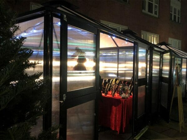 A close up view of Juliana 10x10 Polycarbonate as a jewelry shop with full open doors