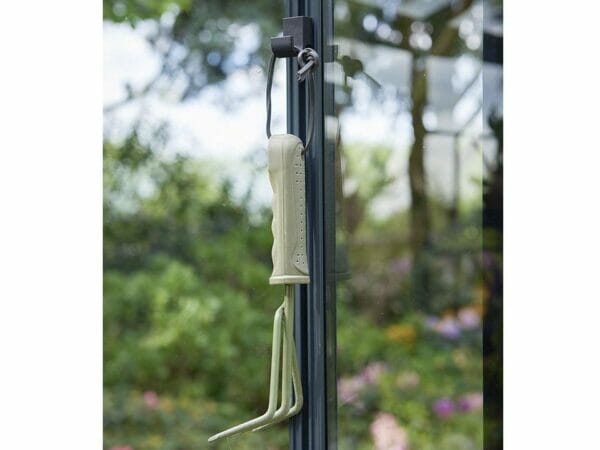 Gardening tool hanging on a Juliana Greenhouse Frame Hook