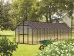 Black Riverstone MONT Greenhouse 8x24 - Mojave Package in a garden