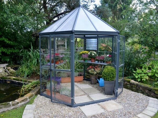 Palram 7ft x 8ft Oasis Hex Greenhouse - HG6000 - in a garden