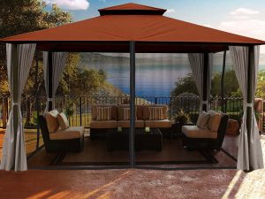 Santa Cruz Gazebo with Rust Sunbrella Top and Open Privacy Curtain and Closed Mosquito Netting