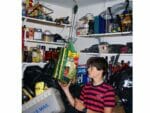 Hanging bags in a storage room using Plant Caddie Hook