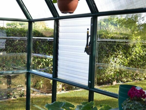 Closed Rion Side Louver Window installed in a greenhouse