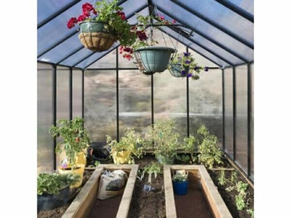 Riverstone Monticello Greenhouse 8x12 - snow load of 24 lbs - interior view with plants and flowers