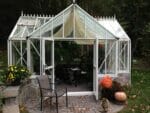 Front view of the Janssens T-Shaped Royal Victorian Antique Orangerie with opened double door