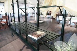 Slat Shelving for Riga and Janssens Greenhouses - 5-slat and 2-slat unit installed in a Janssens Greenhouse