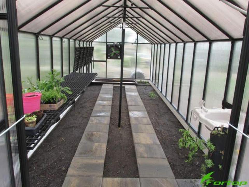 Monticello Work Station Kit installed on the left side of the greenhouse