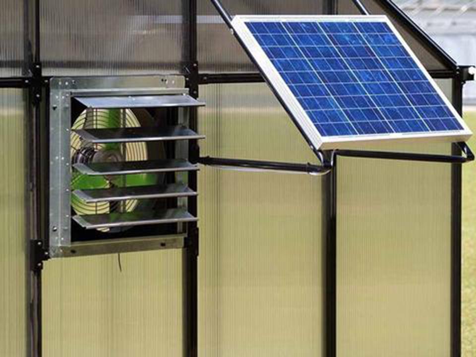 Solar panel on a greenhouse next to a ventilation vent