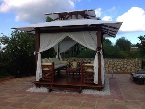 Front view of Handcrafted Balinese Solid Wood Gazebo installed in the garden