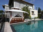 Side view of Handcrafted Balinese Solid Wood Gazebo by the pool