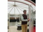 Classico Garden Pavilion with a man standing for Scale