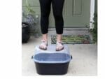 ELHO Bridge Planter with Heavy Duty Strong Cover. A woman standing on top of the planter.