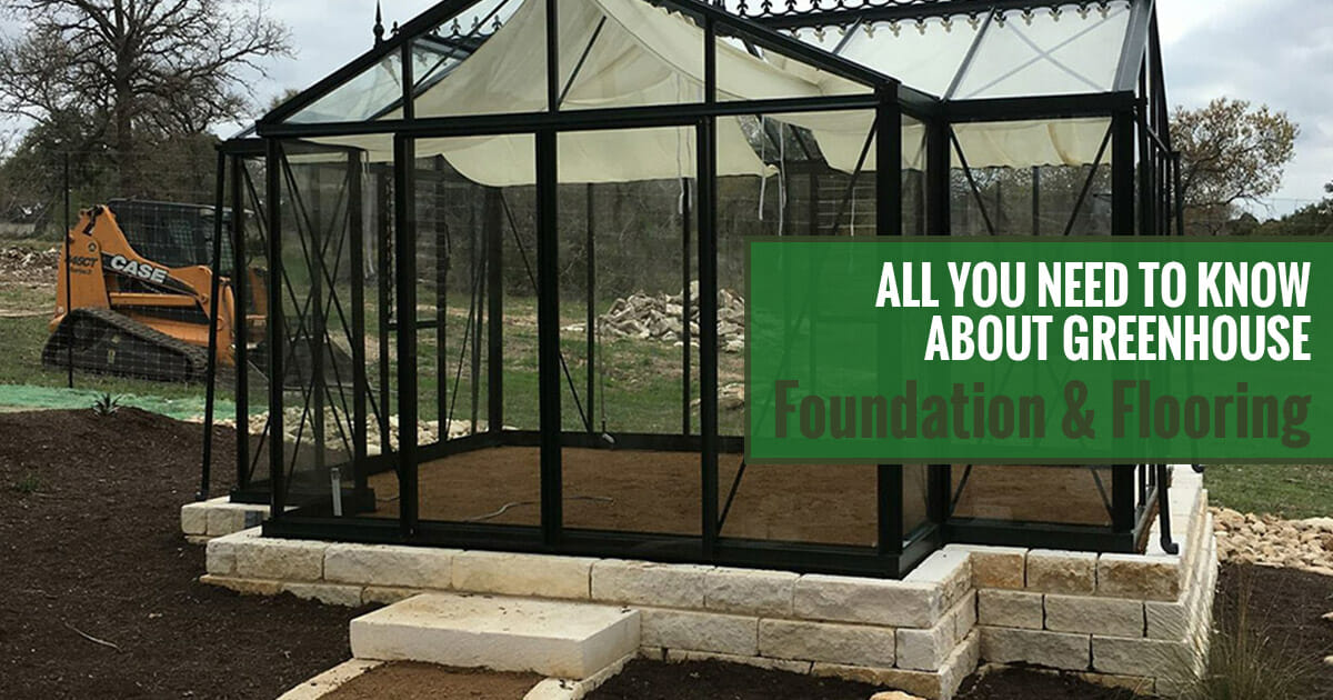 Glass greenhouse on a foundation made of bricks and soil flooring with the text: All you need to know about greenhouse foundation & flooring