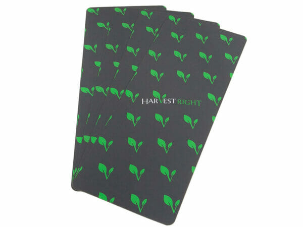 Black colored Harvest Right Medium Silicone Mats set of 4 with green logo
