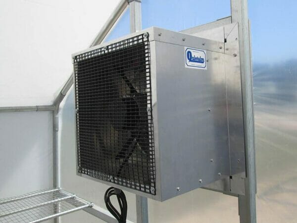 Large Quietaire exhaust fan installed on the sidewall of a Carver Educational Greenhouse