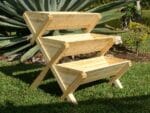 Eden Waterfall Table - cascading planter, side view, empty, bright light