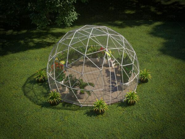 Top view of geodesic dome showing powder coated steel frame and clear vinyl cover, with wooden floor and plants on interior, set on grass landscape