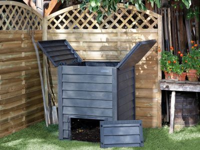 Front view of grey Thermo Wood Composter with top lids open, front bottom door removed for easy access to finished compost