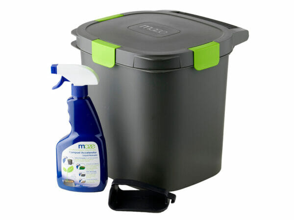 Black compost bucket with lid on, starter bottle of bokashi spray
