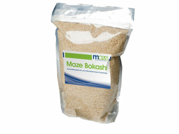Clear plastic bag full of Maze Bokashi Grain, bran which is infused with effective microorganisms (EM) to speed composting and fermentation