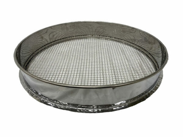 Steel compost sifter on white background, empty sifter showing mesh bottom