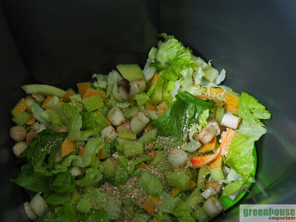 Inside a loaded MAZE Airtight Bokashi Composter with kitchen scraps