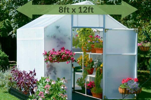 Greenhouse with A-frame roof, exterior view, plants in interior, text in green arrow with dimensions 8ft x 12ft
