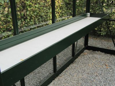 Janssens Seed Tray Shelf installed in a Janssens Glass Greenhouse