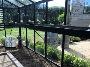 Janssens Seed Tray Shelf in Black installed in Greenhouse