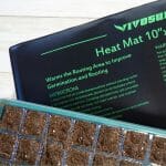 Heat mat with seed tray with text: Are Heat Mats Good for Plants?