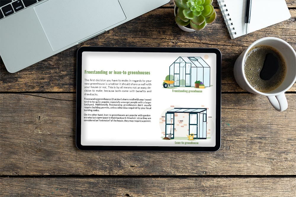 Tablet on a wooden table with plant, coffee, notebook, and laptop, document on tablet is a page of the eBook: Your Greenhouse, Your Choice - A Practical Guide To Picking Your Greenhouse Kit