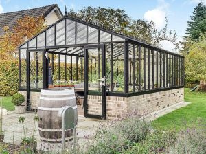 Front of Exaco Janssens Gigant Greenhouse on a brick wall